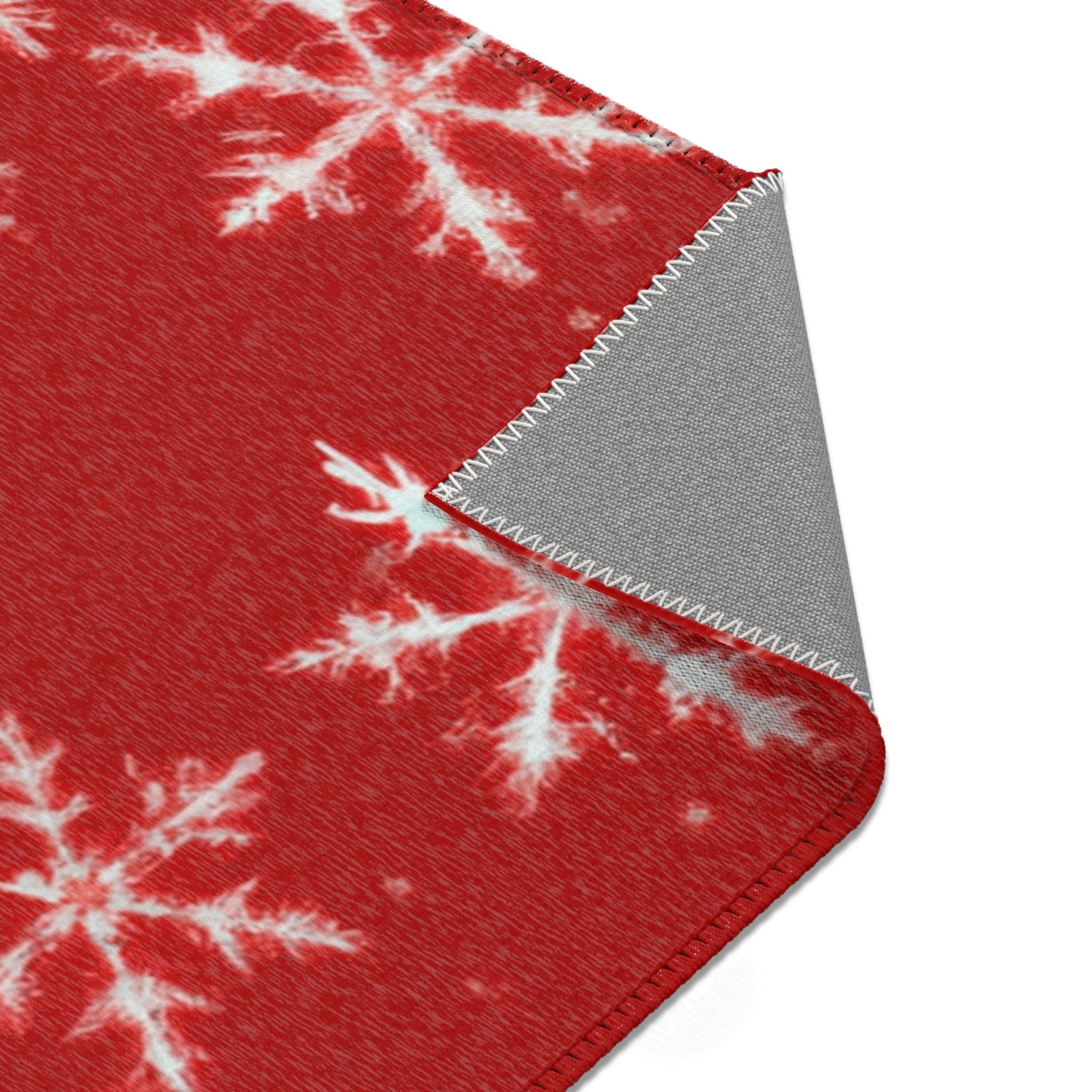 Red and White Snowflake Area Rug